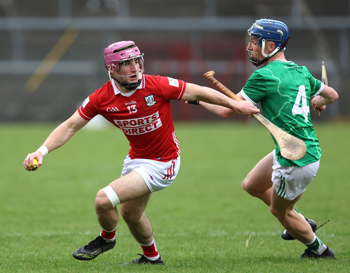 Cork's Callum Coffey looks to get away from Sam Mitchell of Limerick. Picture: Jim Coughlan Cork's Callum Coffey looks to get away from Sam Mitchell of Limerick. Picture: Jim Coughlan