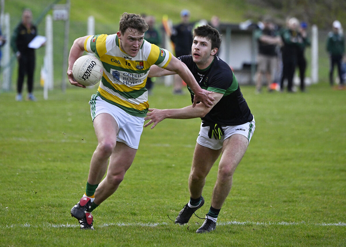 Carbery Rangers' Barry Kerr escapes the clutches of Luke Horgan of Nemo Rangers. Picture: Martin Walsh Carbery Rangers' Barry Kerr escapes the clutches of Luke Horgan of Nemo Rangers. Picture: Martin Walsh