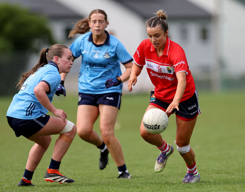  Hannah Sheehy, Cork, in action against Saibhin Peyton, Dublin. Picture: Jim Coughlan.