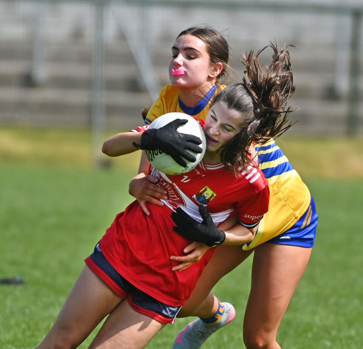 Cork's Aoife Treacy is tackled by Clare's Mylie Treacy. Picture: Eddie O'Hare