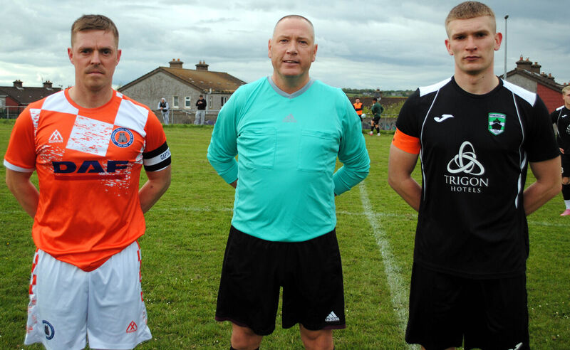 Cathedral Celtic's Jonathon O'Sullivan (left), with Springfield's Caylum Gooney, accompanied by referee Alan McDonnagh. Picture: Barry Peelo. Cathedral Celtic's Jonathon O'Sullivan (left), with Springfield's Caylum Gooney, accompanied by referee Alan McDonnagh. Picture: Barry Peelo.