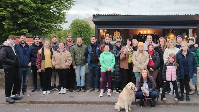 <p>A group of people on the Darkness To Light walk on Saturday outside Coffee Brothers at The Mardyke in Cork city, owned by Adrian and Sean J. Twomey, brother of the late Mark Twomey. Aoibhinn Twomey is at the front with her golden retriever Sophie.</p>