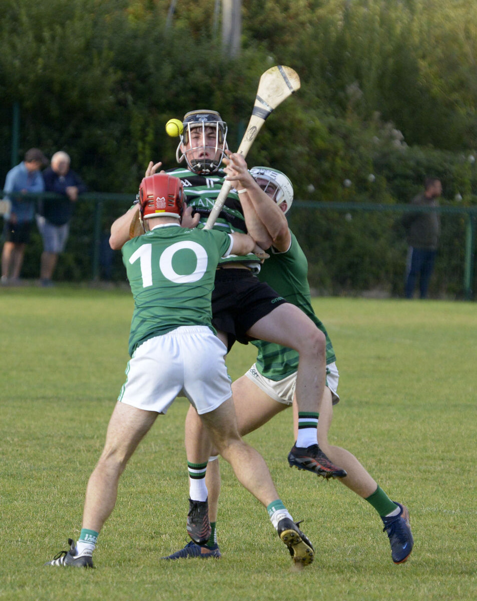 Douglas' Mark O'Brien tackled by Ballincollig's Tadgh Murphy and Ethan Donovan last season. Picture: Denis Boyle Douglas' Mark O'Brien tackled by Ballincollig's Tadgh Murphy and Ethan Donovan last season. Picture: Denis Boyle