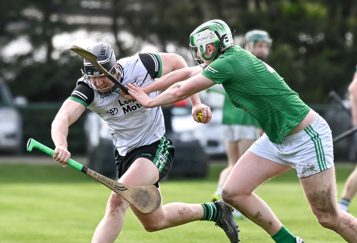 Douglas' Joseph Harte is challenged by Killeagh's Robbie Treacy. Picture: David Keane. Douglas' Joseph Harte is challenged by Killeagh's Robbie Treacy. Picture: David Keane.