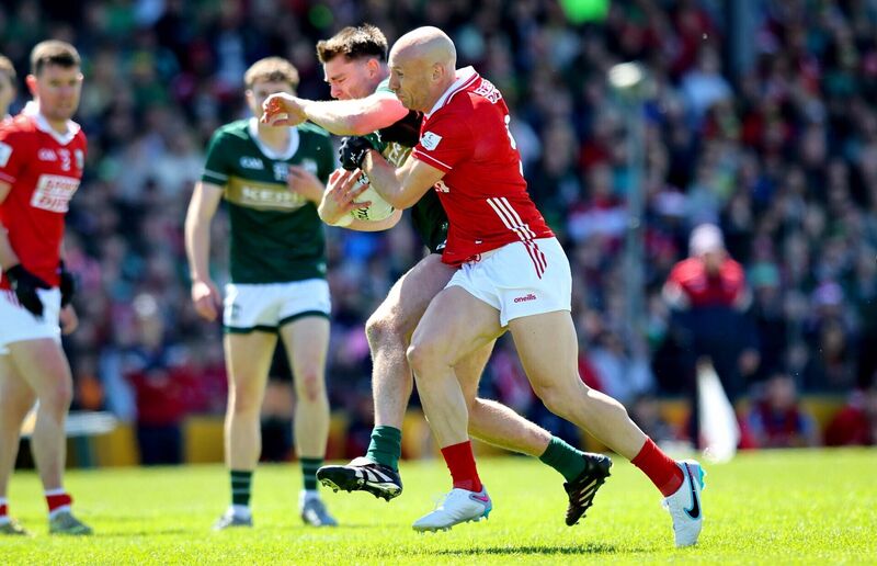Kerry’s Diarmuid O’Connor and Brian O'Driscoll of Cork battle for the ball. Picture: INPHO/Ryan Byrne