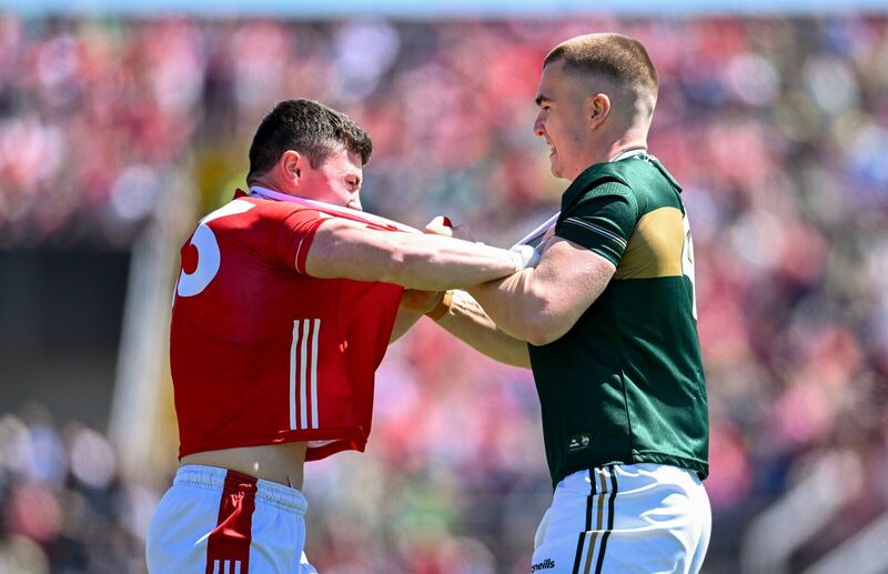 OLD FIRM: Mark Cronin of Cork tussles with Dylan Casey of Kerry. Picture: Paul Phelan/Sportsfile OLD FIRM: Mark Cronin of Cork tussles with Dylan Casey of Kerry. Picture: Paul Phelan/Sportsfile