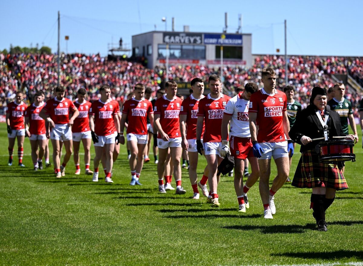 Cork captain Ian Maguire leads his team in the pre-match parade against Kerry. Picture: Paul Phelan/Sportsfile