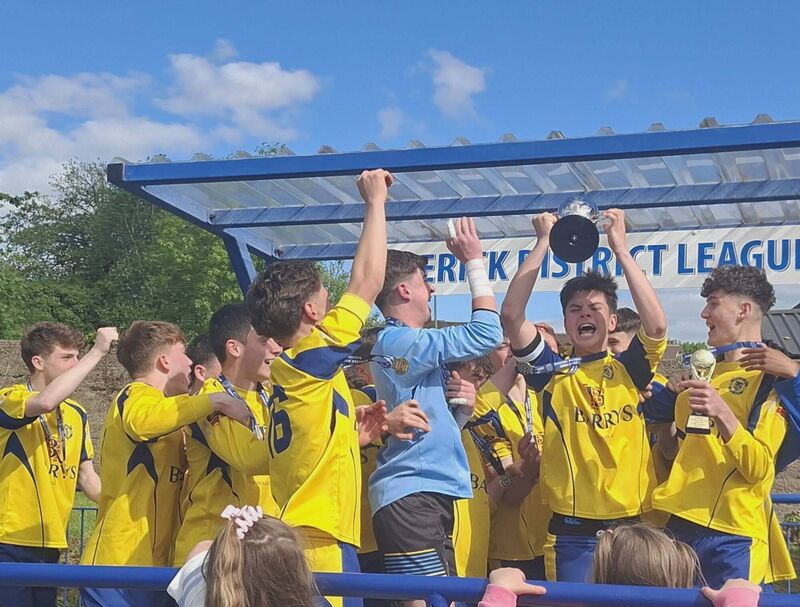 Youth Soccer: Douglas Hall captain Darragh O’Flaherty with his teammates celebrating after winning the Munster FA U17 Cup at Jackman Park in Limerick. Youth Soccer: Douglas Hall captain Darragh O’Flaherty with his teammates celebrating after winning the Munster FA U17 Cup at Jackman Park in Limerick.