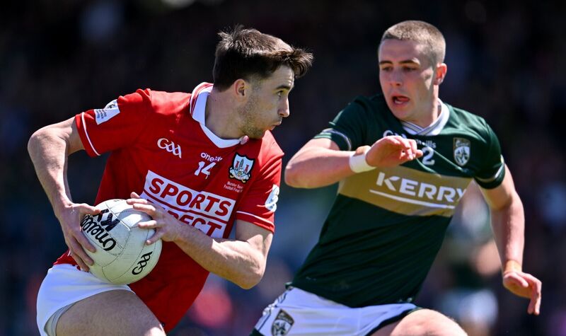 Chris Óg Jones of Cork in action against Evan Looney of Kerry. Picture: Paul Phelan/Sportsfile