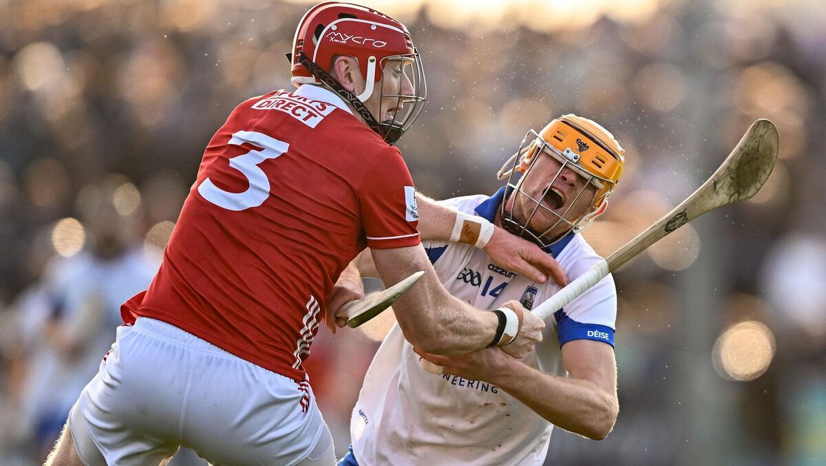Sean Walsh of Waterford is tackled by Damien Cahalane. Picture: Seb Daly/Sportsfile Sean Walsh of Waterford is tackled by Damien Cahalane. Picture: Seb Daly/Sportsfile