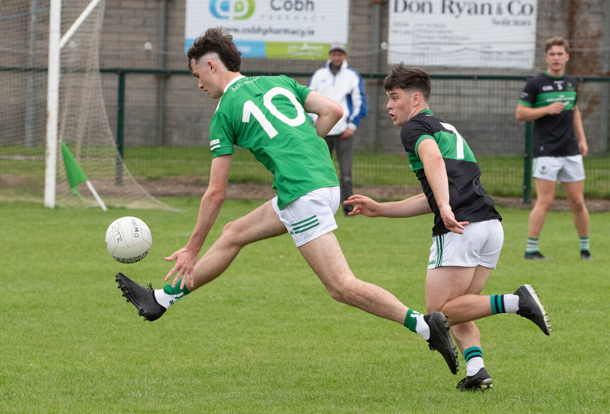 Aghada's Cian Hegarty in full flight as he breaks away from Nemo Rangers' Callum O'Neill last season. Picture: Howard Crowdy