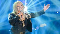 Bonnie Tyler ‘remains seriously ill’ but is stable following emergency surgery