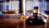 Gavel, scales of justice and law books