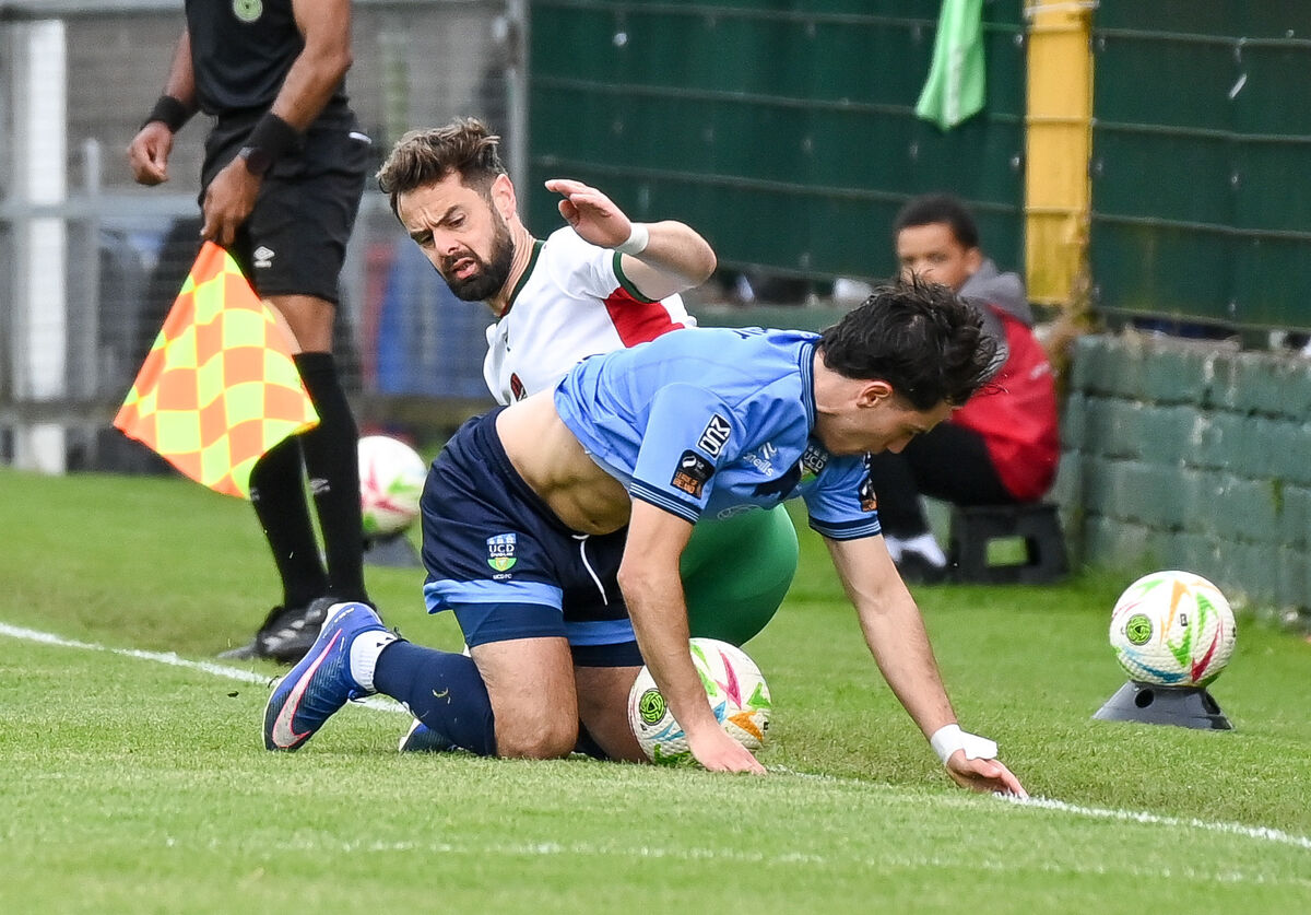  Cork City's Greg Bolger battles on the ground with UCD's Michael McCullagh. Picture: David Keane.