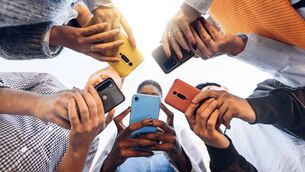 <p>John Arnold was unable to strike up a conversation on a recent train journey because everyone was on their phone. iStock</p>