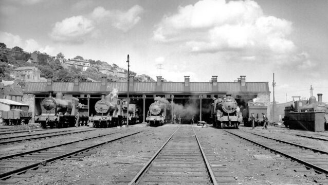<p>Steam trains at Kent Station in July, 1953. Readers today recall their memories of rail travel, and Jo Kerrigan remembers the big gates labelled with Isteach and Amach</p>