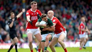 <p>Kerry’s Micheál Burns under pressure from Brian O'Driscoll and Luke Fahy of Cork. Picture: INPHO/Ryan Byrne</p>