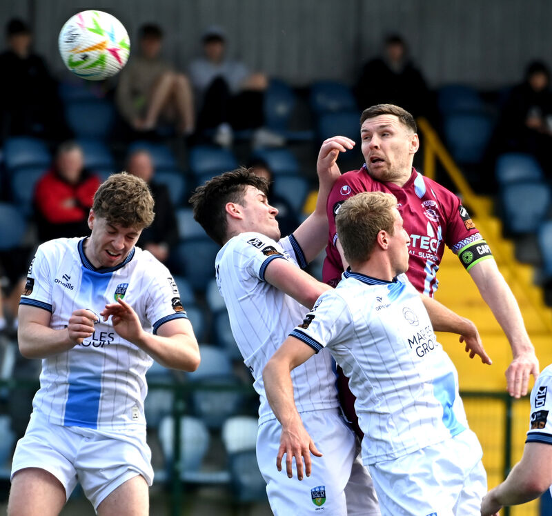 Cobh Ramblers' Garry Buckley outjumps UCD's Carl Lennox, Luca Cailloce and Niall Holohan. Picture: Eddie O'Hare