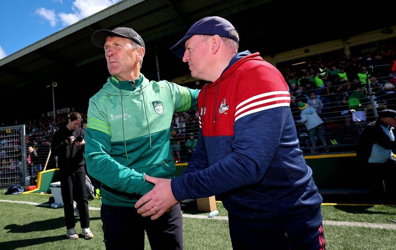 Kerry manager Jack O’Connor and Cork manager John Cleary shake hands after the Munster final. Picture: INPHO/Ryan Byrne