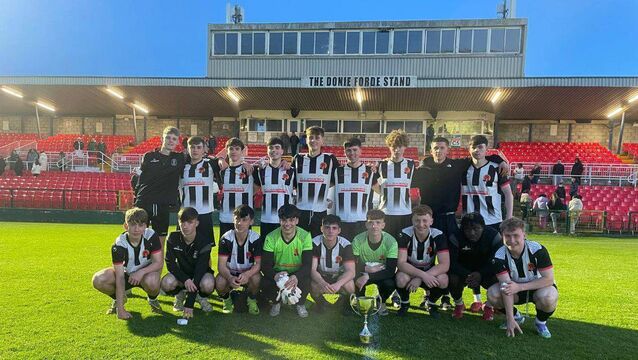 <p>The victorious Midleton side with the U17 Teddy Healy Cup after they beat Fermoy at the Munster FA Turner’s Cross Stadium. </p>