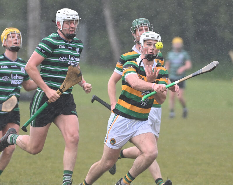 Glen Rovers Adam O'Donovan racing onto the sliotar from Douglas' Conor O'Donovan. Picture: Eddie O'Hare