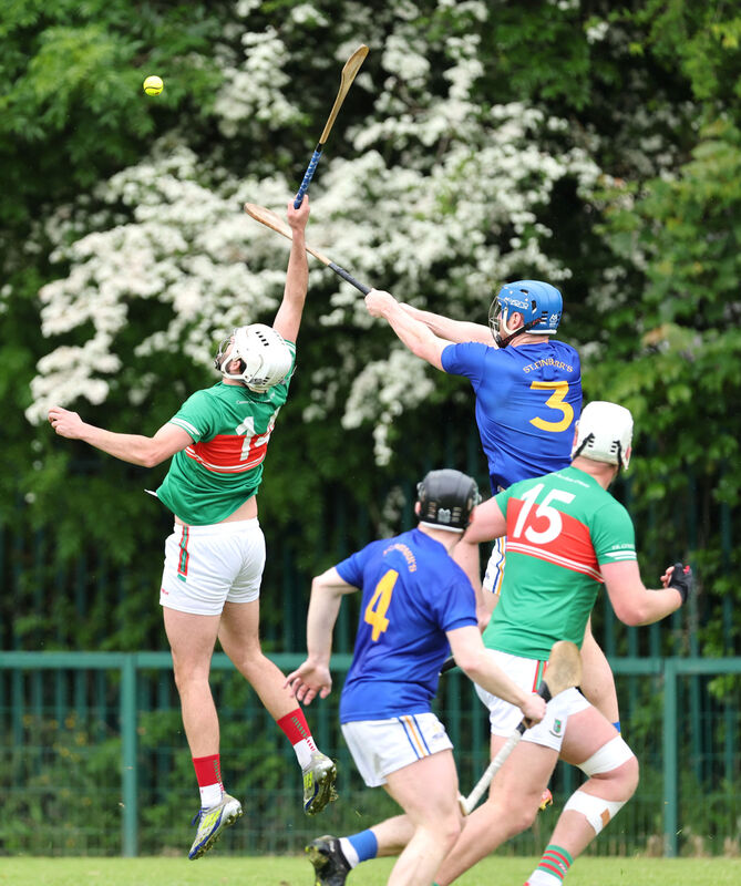 Jamie Burns, St Finbarr's rising high with Michael Wall, Fr O'Neill's. Picture: Jim Coughlan. Jamie Burns, St Finbarr's rising high with Michael Wall, Fr O'Neill's. Picture: Jim Coughlan.
