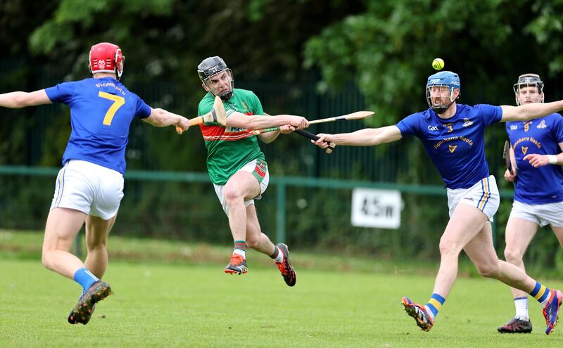 Thomas Egan and Jamie Burns, St Finbarr's, trying to block the shot of Kevin O'Sullivan. Picture: Jim Coughlan. Thomas Egan and Jamie Burns, St Finbarr's, trying to block the shot of Kevin O'Sullivan. Picture: Jim Coughlan.