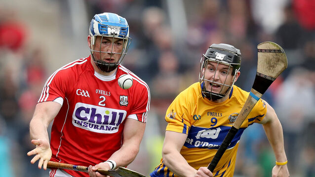 <p>Cork's Seán O'Donoghue gets the ball away despite the attentions of Tony Kelly of Clare during the 2018 Munster SHC game at Páirc Uí Chaoimh - Cork's only victory over Clare in the round-robin era. Picture: Inpho/Oisín Keniry</p>