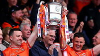 Aidan Forker and Aaron McKay pictured as they lift the Ulster senior football championship cup 17/5/2026