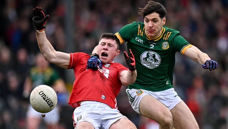 Mark Cronin of Cork is fouled by Seamus Lavin of Meath. Picture: Seb Daly/Sportsfile