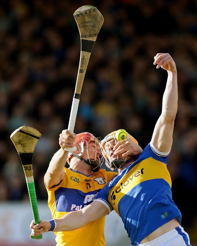 Clare's Peter Duggan wrestling with Ronan Maher of Tipperary. Picture: INPHO/Laszlo Geczo Clare's Peter Duggan wrestling with Ronan Maher of Tipperary. Picture: INPHO/Laszlo Geczo