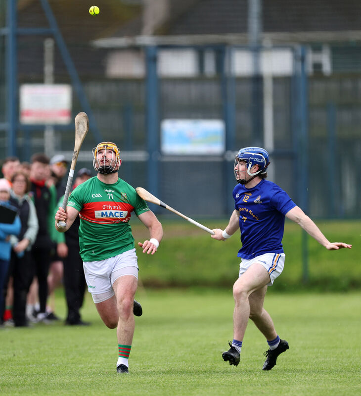 LOOKING UP: Conor McCarthy, St Finbarr's, closes in on Declan Dalton, Fr O'Neill's, at Togher. Picture: Jim Coughlan.