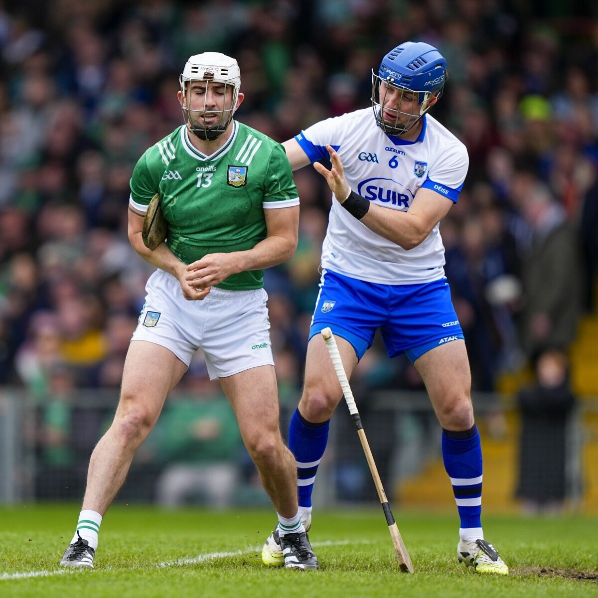 Aaron Gillane of Limerick and Paddy Leavey of Waterford tussle. Picture: INPHO/James Lawlor