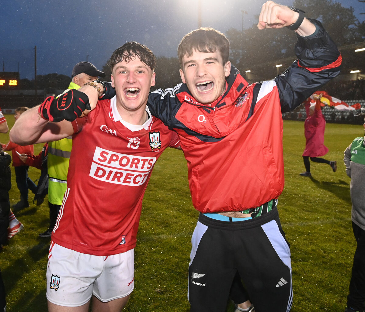Cork player Tom Whooley and supporter Michael Francis Collins celebrate after defeating Kerry. Picture: Eddie O'Hare