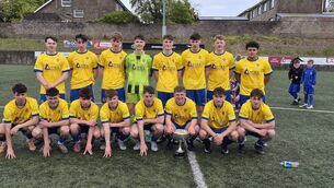 <p>The victorious Carrigaline team with the Daly Industrial Supplies U18 Premier League Cup at Ballea Park.</p>