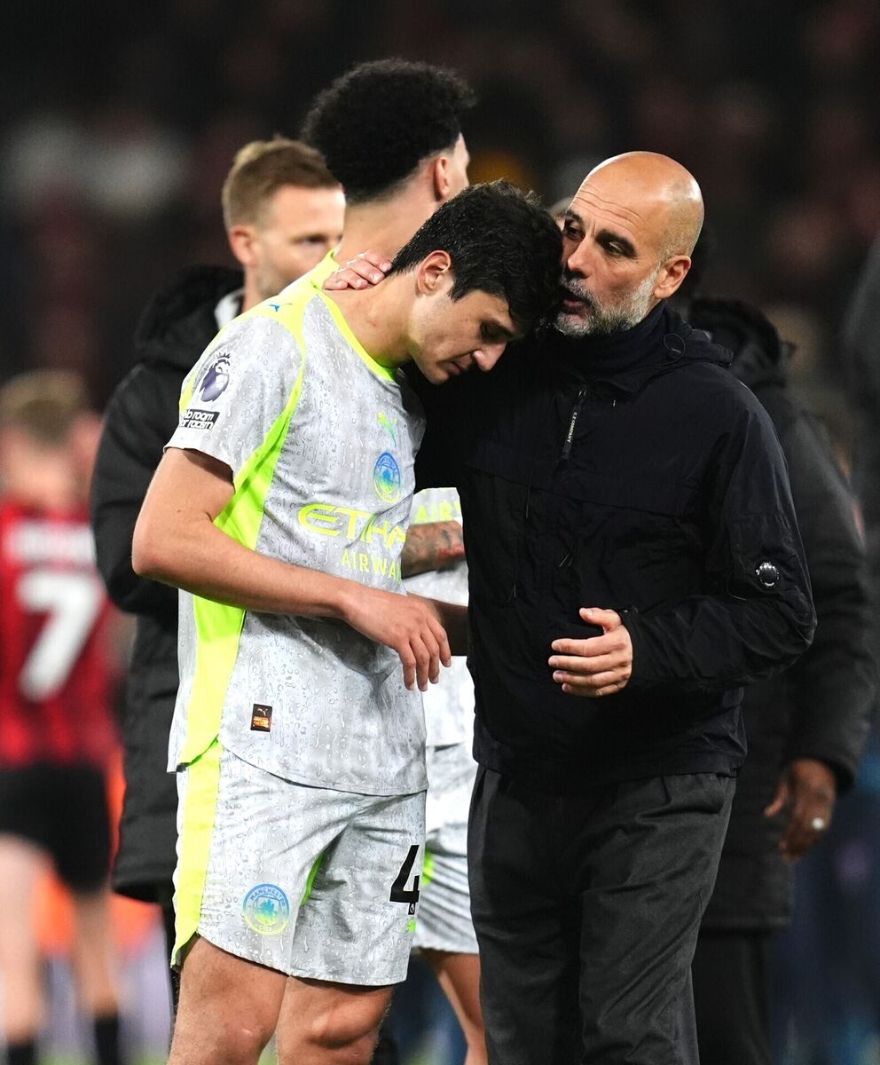 Manchester City manager Pep Guardiola (right) consoles Abdukodir Khusanov after the final whistle in the Premier League match at the Vitality Stadium, Bournemouth. Picture: John Walton/PA Wire