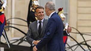 Taoiseach greeted by French president on arrival for talks in Paris Taoiseach greeted by French president on arrival for talks in Paris