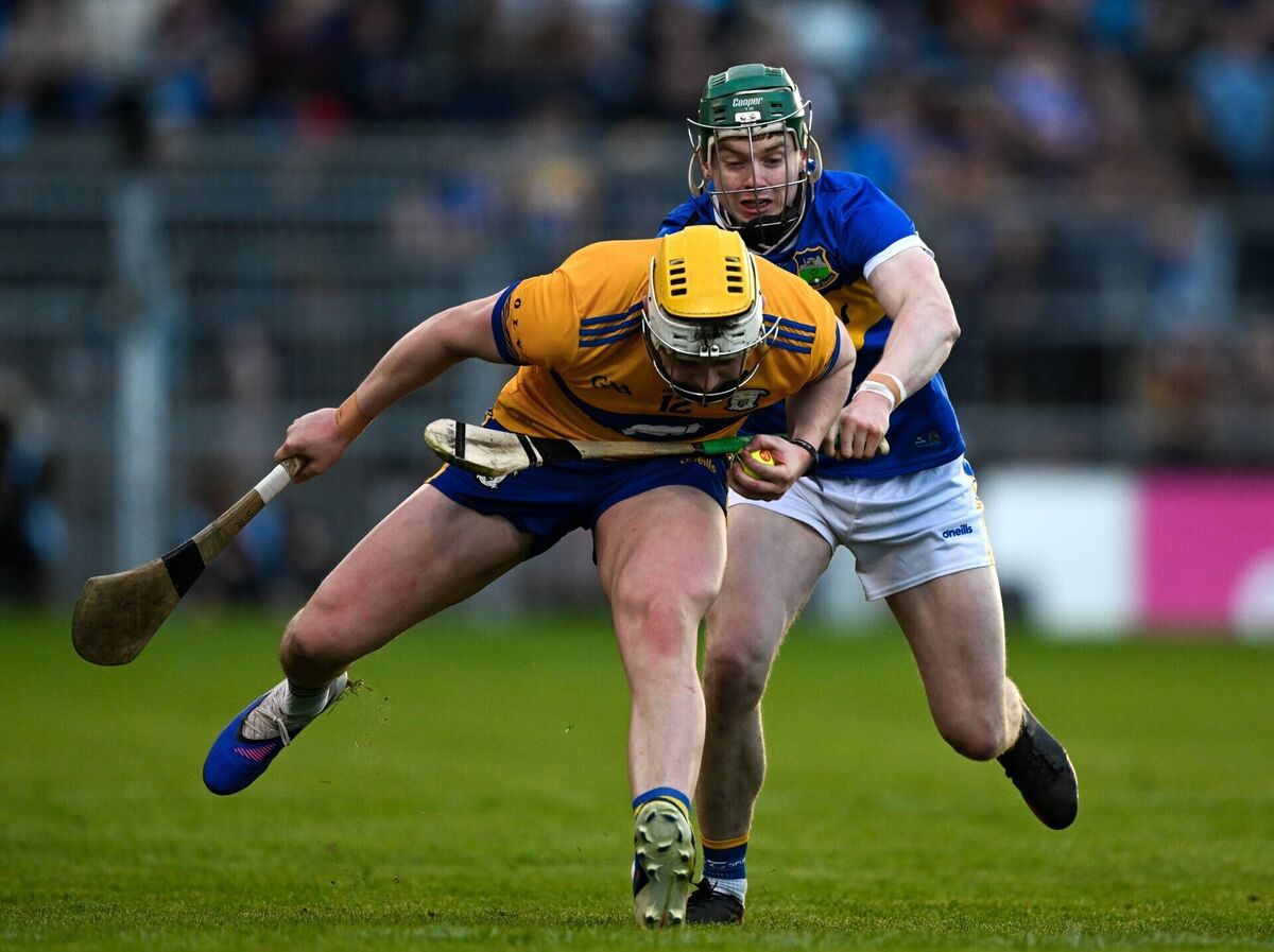 Sean Rynne of Clare is tackled by Darragh Stakelum of Tipperary. Picture: Ray McManus/Sportsfile Sean Rynne of Clare is tackled by Darragh Stakelum of Tipperary. Picture: Ray McManus/Sportsfile