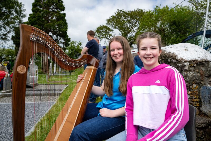 Sisters Bríd and Caoimhe Finn provided musical accompaniment during the ceremony. Sisters Bríd and Caoimhe Finn provided musical accompaniment during the ceremony.