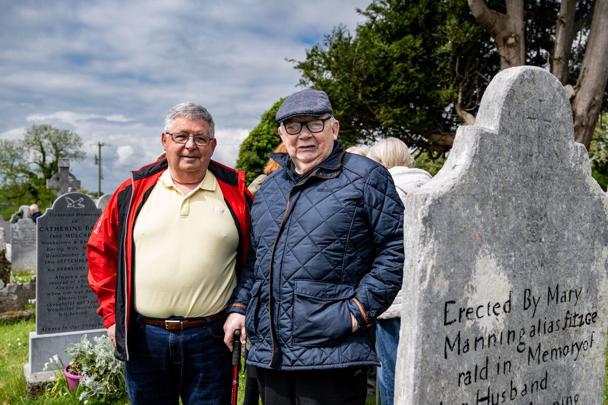  Eugene O’Callaghan and Billy Kidney pictured among the historic tombstones at Templecurraheen graveyard.