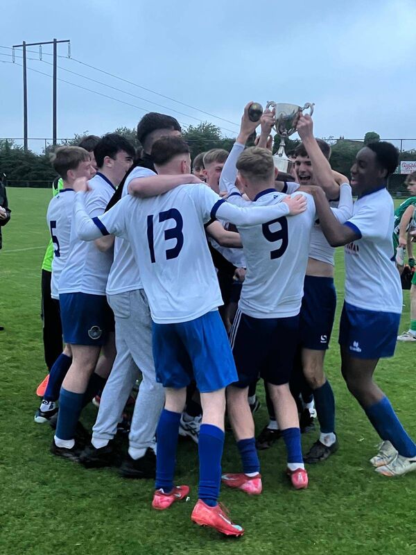 The victorious Blarney United U18 team celebrating with the Sean Williams Cup after they beat Passage at Castletreasure The victorious Blarney United U18 team celebrating with the Sean Williams Cup after they beat Passage at Castletreasure