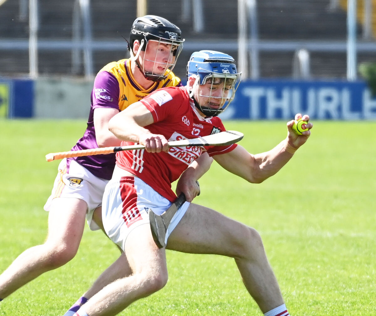 Cork's Calllum Coffey tries to hold off Wexford's Ryan Walsh. Picture: Eddie O'Hare