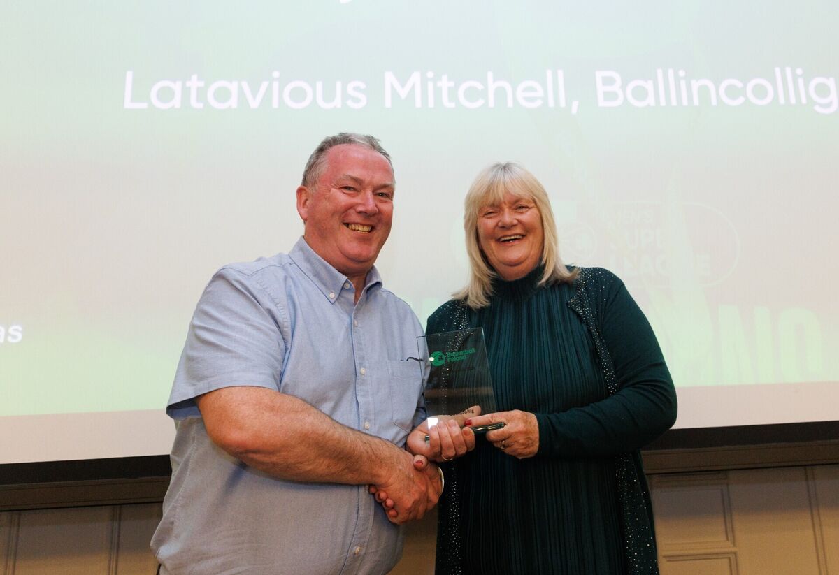 Ballincollig manager TJ McMahon accepts the Domino's Men's Super League Player of the Year award on behalf of Latavious Mitchell at the 2026 Basketball Ireland Annual Awards at the Osprey Hotel, Naas, presented by Breda Dick