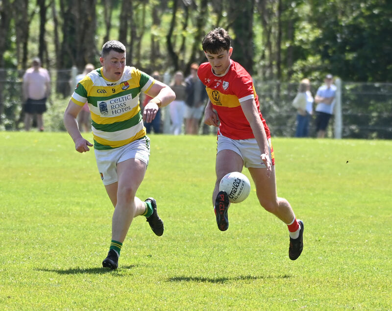 Eíre Óg's Darragh Clifford goes past Carbery Rangers' Mark Hodnett. Picture: Eddie O'Hare