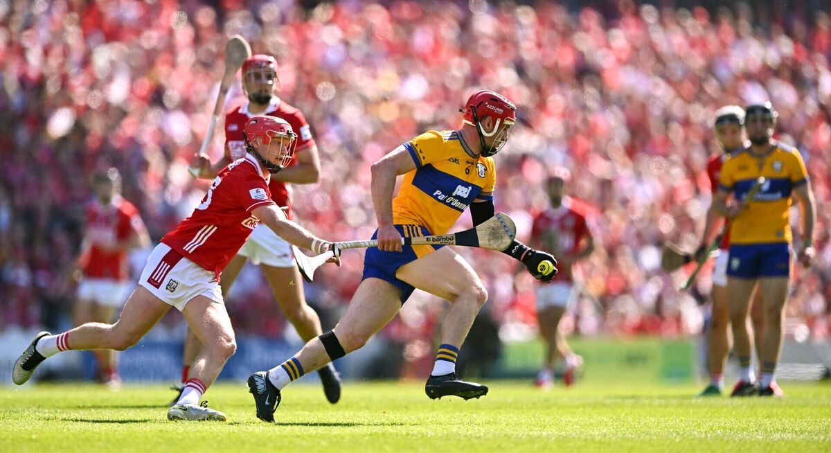 Cork's Alan Connolly tracks John Conlon of Clare. Picture: Piaras Ó Mídheach/Sportsfile Cork's Alan Connolly tracks John Conlon of Clare. Picture: Piaras Ó Mídheach/Sportsfile