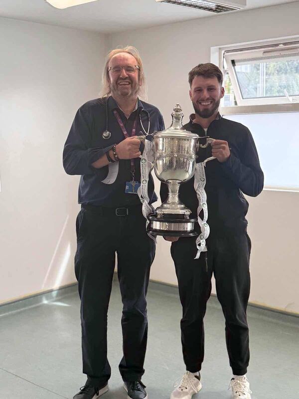 Golfer David Howard (right), who lives with CF during an emotional reunion with Consultant Respiratory Physician at Cork University Hospital, Professor Barry Plant. 