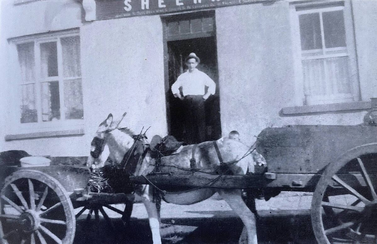 Sheehan’s pub in Whitegate, which had three steps, recalls Micheál Kenefick, and was beside the post office. This was an era when donkeys and carts were the main mode of transport Picture supplied by Micheál Kenefick Sheehan’s pub in Whitegate, which had three steps, recalls Micheál Kenefick, and was beside the post office. This was an era when donkeys and carts were the main mode of transport Picture supplied by Micheál Kenefick