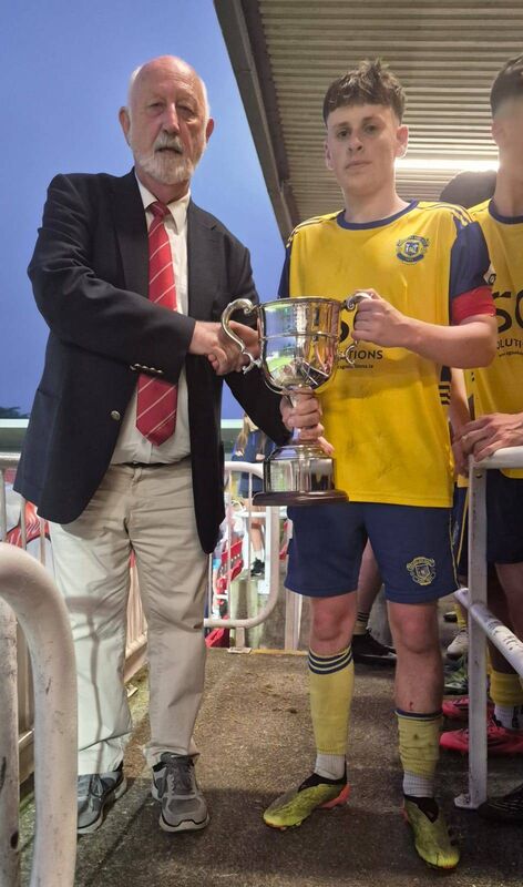 Sean O’Sullivan, chairman of the Cork Youth League presents the U18 Murphy Cup to Douglas Hall captain Matthew Dowling at the Munster FA Turner’s Cros Sean O’Sullivan, chairman of the Cork Youth League presents the U18 Murphy Cup to Douglas Hall captain Matthew Dowling at the Munster FA Turner’s Cros