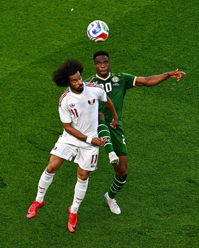 Chiedozie Ogbene of Republic of Ireland in action against Akram Afif of Qatar during the international friendly match between Republic of Ireland and Qatar at the Aviva Stadium in Dublin. Photo by Tyler Miller/Sportsfile Chiedozie Ogbene of Republic of Ireland in action against Akram Afif of Qatar during the international friendly match between Republic of Ireland and Qatar at the Aviva Stadium in Dublin. Photo by Tyler Miller/Sportsfile