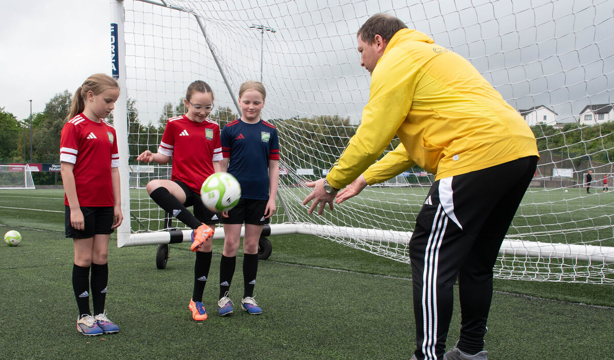 Head of Coaching Denis Behan giving tips on football skills to CWSSL Academy Girls Isabelle Kiely, Muireann Louadah and Aisling Behan at the launch of the CWSSL Coerver Coaching summer camps. Picture: Howard Crowdy Head of Coaching Denis Behan giving tips on football skills to CWSSL Academy Girls Isabelle Kiely, Muireann Louadah and Aisling Behan at the launch of the CWSSL Coerver Coaching summer camps. Picture: Howard Crowdy
